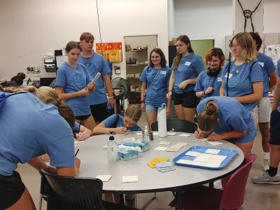 Group of kids gathered around table